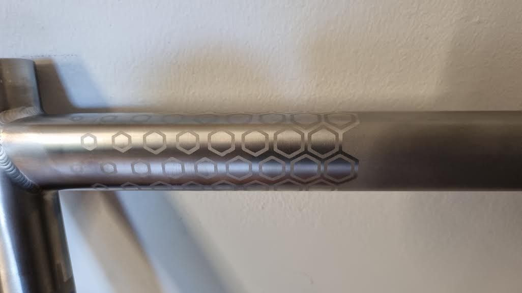 beautiful bead blasted hexagons smooth the transition from bead blasted to the natural brushed titanium